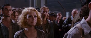 Movie still from “Black Book” (2006), directed by Paul Verhoeven – A group of people standing in a room; Close Up shot, Low angle