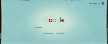Movie still from “Black Box” (2021), directed by Yann Gozlan – A computer screen showing a google search page; Extreme Close Up shot, Overhead angle