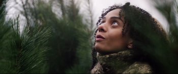 Movie still from “Black Christmas” (2019), directed by Sophia Takal – A person looking up at the sky; Close Up shot, Low angle