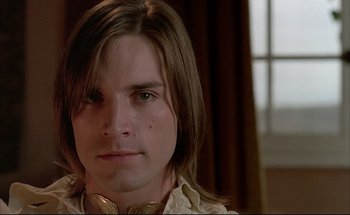 Movie still from “Black Moon” (1975), directed by Louis Malle – A person with long brown hair; Close Up shot, Low angle