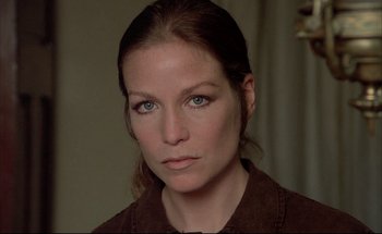 Movie still from “Black Moon” (1975), directed by Louis Malle – A person wearing a brown shirt; Close Up shot, Low angle