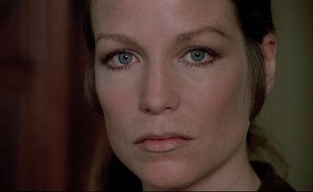 Movie still from “Black Moon” (1975), directed by Louis Malle – A woman's face with blue eyes; Close Up shot, High angle