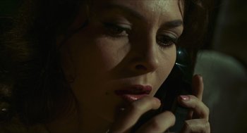 Movie still from “Black Sabbath” (1963), directed by Mario Bava – A person talking on a phone; Close Up shot, Overhead angle