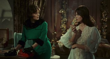 Movie still from “Black Sabbath” (1963), directed by Mario Bava – Two women are standing next to each other; Medium shot, Over the shoulder angle