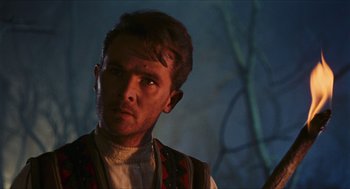 Movie still from “Black Sabbath” (1963), directed by Mario Bava – A person wearing a necklace; Close Up shot, Low angle