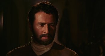 Movie still from “Black Sabbath” (1963), directed by Mario Bava – A person with a beard; Close Up shot, Over the shoulder angle