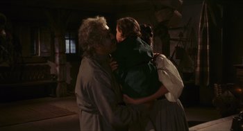 Movie still from “Black Sabbath” (1963), directed by Mario Bava – An old man kissing a little girl on the cheek; Medium shot, Over the shoulder angle