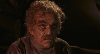 Movie still from “Black Sabbath” (1963), directed by Mario Bava – An old man with a very dark look on his face; Close Up shot, Low angle
