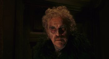 Movie still from “Black Sabbath” (1963), directed by Mario Bava – A person wearing a costume; Close Up shot, Low angle