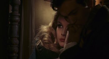 Movie still from “Black Sabbath” (1963), directed by Mario Bava – A man and a woman looking at the camera; Close Up shot, Over the shoulder angle