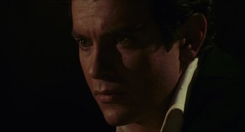 Movie still from “Black Sabbath” (1963), directed by Mario Bava – A man's face in the dark; Close Up shot, Over the shoulder angle
