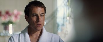 Movie still from “Black Sea” (2014), directed by Kevin Macdonald – A person wearing a robe; Close Up shot, Over the shoulder angle