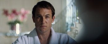 Movie still from “Black Sea” (2014), directed by Kevin Macdonald – A person wearing a robe; Close Up shot, Low angle