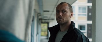 Movie still from “Black Sea” (2014), directed by Kevin Macdonald – A person with a beard; Close Up shot, Low angle