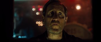 Movie still from “Black Sea” (2014), directed by Kevin Macdonald – A person looking up at the sky; Close Up shot, Low angle