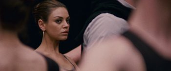 Movie still from “Black Swan” (2010), directed by Darren Aronofsky – A woman looking into a mirror while sitting down; Close Up shot, Over the shoulder angle