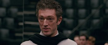 Movie still from “Black Swan” (2010), directed by Darren Aronofsky – A person wearing a black and white shirt; Close Up shot, High angle