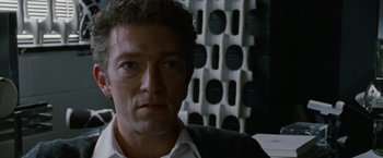 Movie still from “Black Swan” (2010), directed by Darren Aronofsky – A person wearing a white shirt; Close Up shot, Low angle