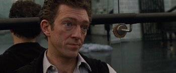 Movie still from “Black Swan” (2010), directed by Darren Aronofsky – A person wearing a shirt and vest; Close Up shot, Over the shoulder angle