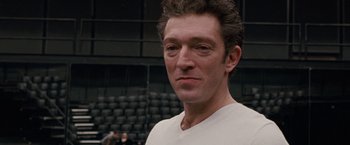 Movie still from “Black Swan” (2010), directed by Darren Aronofsky – A person wearing a white shirt; Close Up shot, Over the shoulder angle