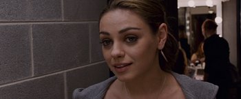 Movie still from “Black Swan” (2010), directed by Darren Aronofsky – A person wearing a gray jacket; Close Up shot, Over the shoulder angle