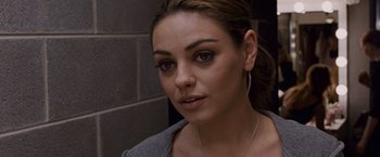 Movie still from “Black Swan” (2010), directed by Darren Aronofsky – A person wearing a gray shirt; Close Up shot, Over the shoulder angle