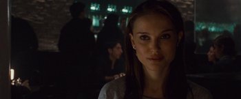 Movie still from “Black Swan” (2010), directed by Darren Aronofsky – A person in a dark room; Close Up shot, Over the shoulder angle