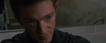 Movie still from “Black Swan” (2010), directed by Darren Aronofsky – A man's face as he stares into the camera; Close Up shot, High angle