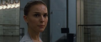 Movie still from “Black Swan” (2010), directed by Darren Aronofsky – A person wearing a white shirt; Close Up shot, Over the shoulder angle