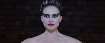 Movie still from “Black Swan” (2010), directed by Darren Aronofsky – A person wearing a costume; Close Up shot, Low angle