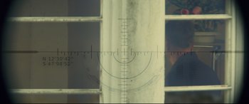 Movie still from “Black Widow” (2021), directed by Cate Shortland – An image of a ruler on a window; Extreme Close Up shot, Over the shoulder angle
