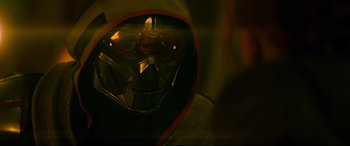 Movie still from “Black Widow” (2021), directed by Cate Shortland – A helmet on a person's face; Close Up shot, Over the shoulder angle