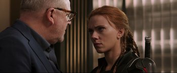 Movie still from “Black Widow” (2021), directed by Cate Shortland – A man and a woman face each other; Close Up shot, Over the shoulder angle