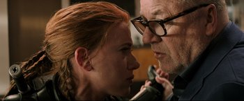 Movie still from “Black Widow” (2021), directed by Cate Shortland – A man and a woman looking at each other; Close Up shot, Over the shoulder angle