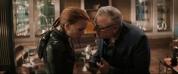 Movie still from “Black Widow” (2021), directed by Cate Shortland – A man and a woman looking at one another; Close Up shot, Over the shoulder angle