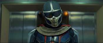 Movie still from “Black Widow” (2021), directed by Cate Shortland – A person wearing a mask; Close Up shot, Low angle