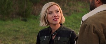 Movie still from “Black Widow” (2021), directed by Cate Shortland – A person wearing a vest; Close Up shot, Over the shoulder angle