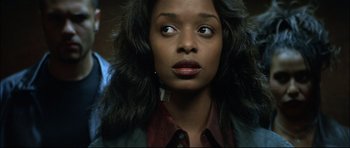 Movie still from “Blade” (1998), directed by Stephen Norrington – A person wearing a jacket; Close Up shot, Low angle