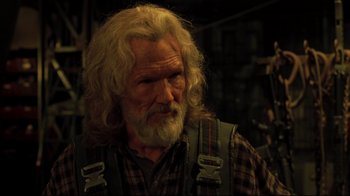 Movie still from “Blade II” (2002), directed by Guillermo del Toro – An old man with long white hair and a beard; Close Up shot, Over the shoulder angle