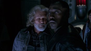 Movie still from “Blade II” (2002), directed by Guillermo del Toro – Two men standing next to each other in the dark; Close Up shot, Low angle