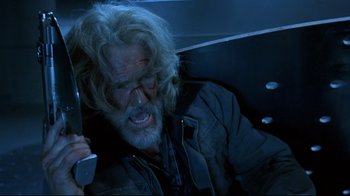 Movie still from “Blade II” (2002), directed by Guillermo del Toro – An old man with long white hair holding a knife; Close Up shot, Low angle