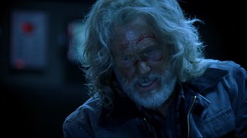 Movie still from “Blade II” (2002), directed by Guillermo del Toro – A person wearing a jacket; Close Up shot, Over the shoulder angle