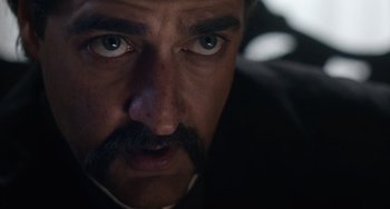 Movie still from “Tesla” (2020), directed by Michael Almereyda – A person with a mustache; Extreme Close Up shot, Low angle