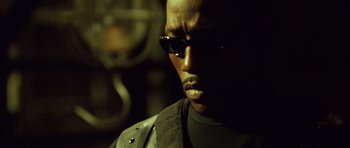 Movie still from “Blade: Trinity” (2004), directed by David S. Goyer – A person wearing sunglasses; Close Up shot, Low angle