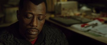 Movie still from “Blade: Trinity” (2004), directed by David S. Goyer – A person with his eyes closed; Close Up shot, High angle