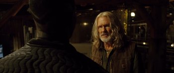 Movie still from “Blade: Trinity” (2004), directed by David S. Goyer – An older man with long white hair and a beard; Close Up shot, Over the shoulder angle