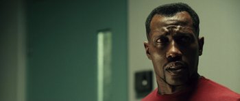 Movie still from “Blade: Trinity” (2004), directed by David S. Goyer – A man's face in front of a mirror; Close Up shot, Low angle
