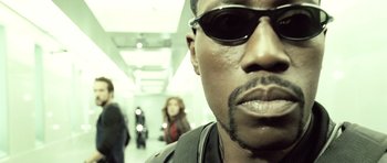 Movie still from “Blade: Trinity” (2004), directed by David S. Goyer – A person wearing sunglasses; Close Up shot, Low angle
