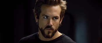 Movie still from “Blade: Trinity” (2004), directed by David S. Goyer – A person with a beard; Close Up shot, Over the shoulder angle