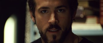 Movie still from “Blade: Trinity” (2004), directed by David S. Goyer – A person with a beard; Close Up shot, Over the shoulder angle